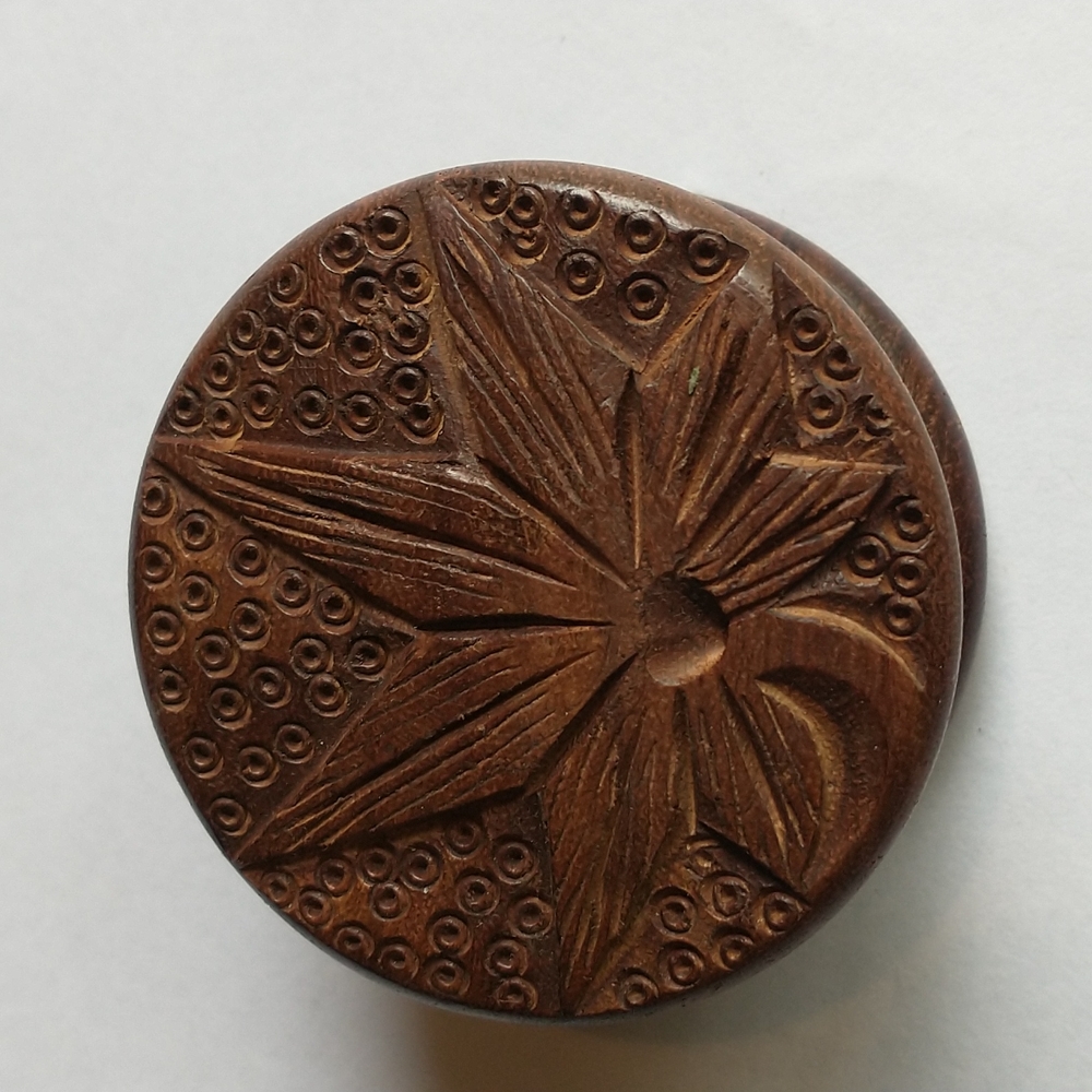 Hand made wooden grinder